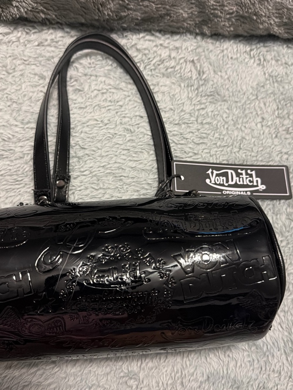 Von Dutch Black Patent Logo Embossed Barrel Bag